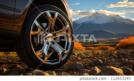 SUV car on top of mountain with beautiful scenery, closeup wheel, Generate Ai. SUV car on top of mountain with beautiful scenery, closeup wheel, Generate Ai. 112653245