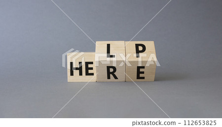 Help is here symbol. Turned wooden cubes with words Here to Help. Beautiful grey background. Business and Help is here concept. Copy space Help is here symbol. Turned wooden cubes with words Here to Help. Beautiful grey background. Business and Help is here concept. Copy space 112653825