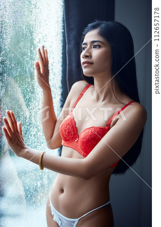 Young asian girl in the redlingerie posing in her room Young asian girl in the redlingerie posing in her room 112657178