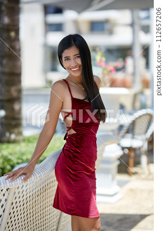 Young asian sexy woman in a white dress posing at hotel territory 112657206