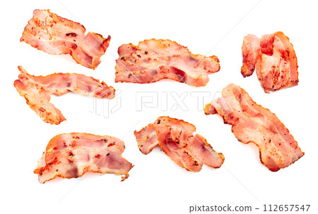 Fried bacon slices isolated on white. 112657547