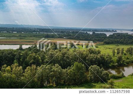 View of the Spassky Cathedral and the city of Yelabuga from the bell tower of the Spassky Cathedral on a sunny spring day. Yelabuga, Tatarstan, Russia View of the Spassky Cathedral and the city of Yelabuga from the bell tower of the Spassky Cathedral on a sunny spring day. Yelabuga, Tatarstan, Russia 112657598