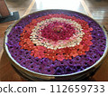 Flowers floating on water 112659733