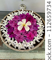 Plumeria floating in water 112659734