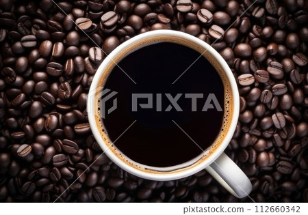 Aromatic morning bliss! Freshly brewed coffee in a classic cup surrounded by roasted beans Aromatic morning bliss! Freshly brewed coffee in a classic cup surrounded by roasted beans 112660342
