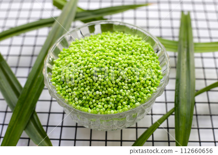 Small tapioca pearls, pandan sago seeds Small tapioca pearls, pandan sago seeds 112660656