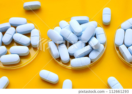 "PrEP" ( Pre-Exposure Prophylaxis) used to help protect people from HIV, yellow background. 112661293