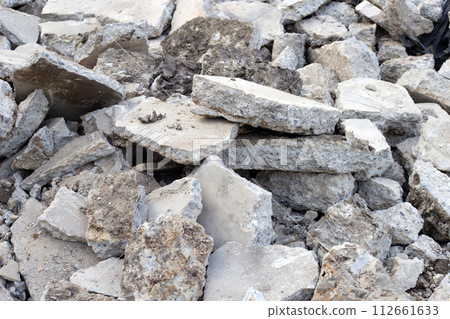 Piles of rubble after house demolition 112661633