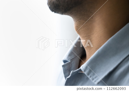 Unknown young man neck and shirt collar, closeup side view Unknown young man neck and shirt collar, closeup side view 112662093
