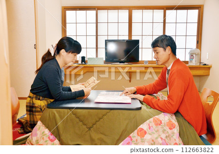 Travel planning: spread out the map in a Japanese-style room Travel planning: spread out the map in a Japanese-style room 112663822