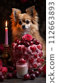 A luxurious cake with cherries arranged in a heart shape, next to it is a chihuahua 112663893