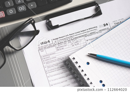 Tax income concept US tax form on table 112664020
