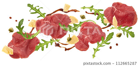 Falling beef carpaccio ingredients, arugula, parmesan cheese and balsamic sauce splash isolated on white background with clipping path 112665287