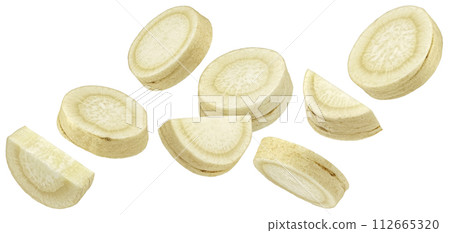 Falling parsley root slices isolated on white background with clipping path 112665320
