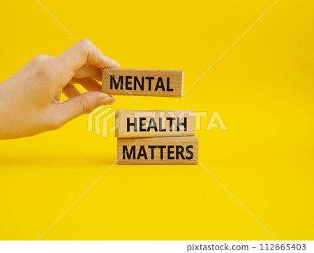 Mental Health Matters symbol. Concept words Mental Health Matters on wooden blocks. Beautiful yellow background. Doctor hand. Healthcare and Mental Health Matters concept. Copy space. Mental Health Matters symbol. Concept words Mental Health Matters on wooden blocks. Beautiful yellow background. Doctor hand. Healthcare and Mental Health Matters concept. Copy space. 112665403