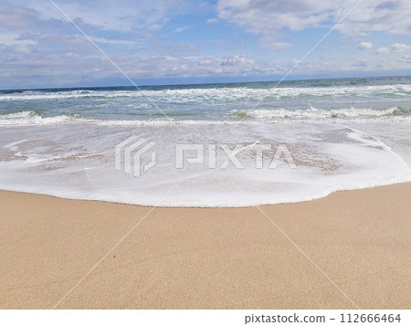 Waves to beat on the sandy beach Waves to beat on the sandy beach 112666464