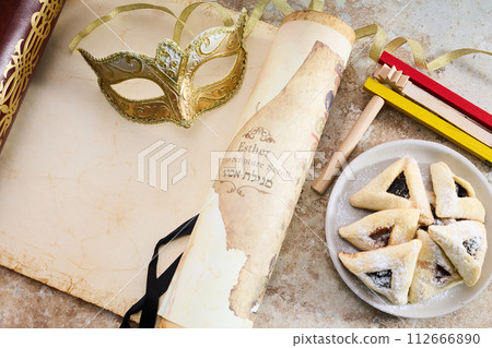 Scroll of Esther, haman's ears cookies.and Purim Festival objects 112666890