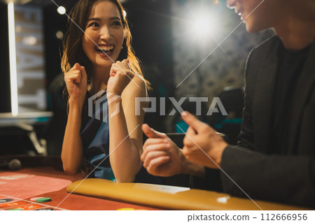 Couple dating at a casino 112666956