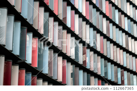 Bright panels of colorful on Modern architecture of Mizuho bank office building. 112667365