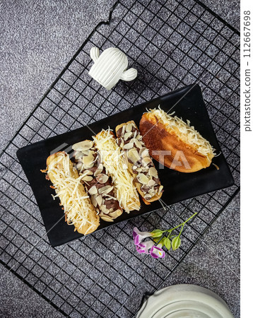 image of crispy toast fried in charcoal 112667698