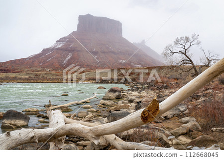 Colorado River at Rocky Rapid above Moab, Utah, in a foggy winter scenery Colorado River at Rocky Rapid above Moab, Utah, in a foggy winter scenery 112668045