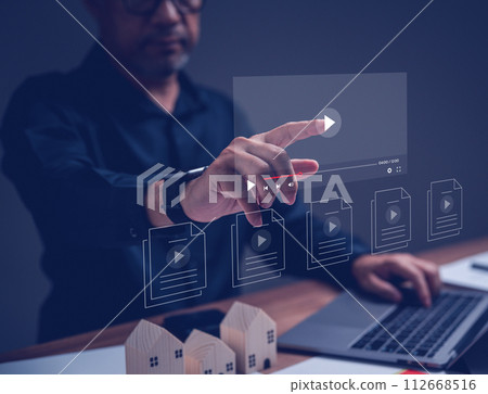 Businessman making video content of business 4.0 in 2023. Man using hand and keyboard for streaming online on virtual screen, watching video on internet, live concert, show or tutorial, content online Businessman making video content of business 4.0 in 2023. Man using hand and keyboard for streaming online on virtual screen, watching video on internet, live concert, show or tutorial, content online 112668516