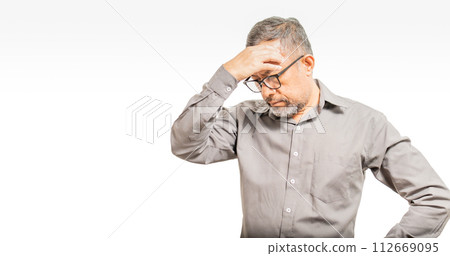 Anxious and stressed businessman due to marketing, finance, and banking planning makes wrong decisions that put investments in real estate, automotive, technology at risk, loss. copy space on left Anxious and stressed businessman due to marketing, finance, and banking planning makes wrong decisions that put investments in real estate, automotive, technology at risk, loss. copy space on left 112669095