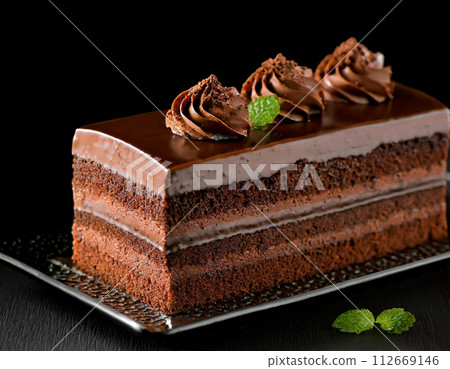 Rich and delicious chocolate cake Rich and delicious chocolate cake 112669146
