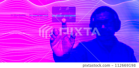 Sound engineers are Metaverse and select, playing music to check the sound quality. The concept for entertainment, games, movies, dramas with metaverse. Man wear headphones, selective focus, copyspace 112669198