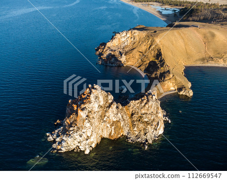 Shamanka Rock. Lake Baikal at Olkhon Island. the village of Khuzhir 112669547