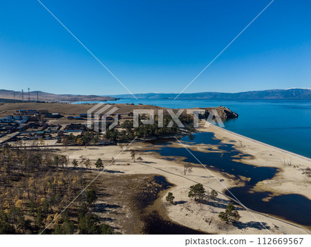 Sarayskiy beach. Shamanka Rock. Lake Baikal at Olkhon Island. the village of Khuzhir 112669567