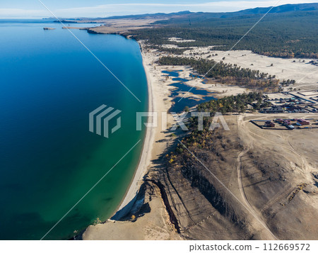 Sarayskiy beach. Shamanka Rock. Lake Baikal at Olkhon Island. the village of Khuzhir 112669572