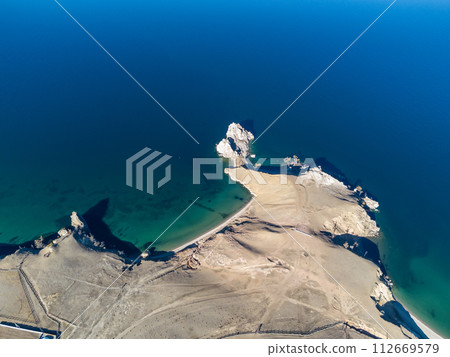 Sarayskiy beach. Shamanka Rock. Lake Baikal at Olkhon Island. the village of Khuzhir 112669579