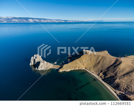 Shamanka Rock. Lake Baikal at Olkhon Island. the village of Khuzhir Shamanka Rock. Lake Baikal at Olkhon Island. the village of Khuzhir 112669581