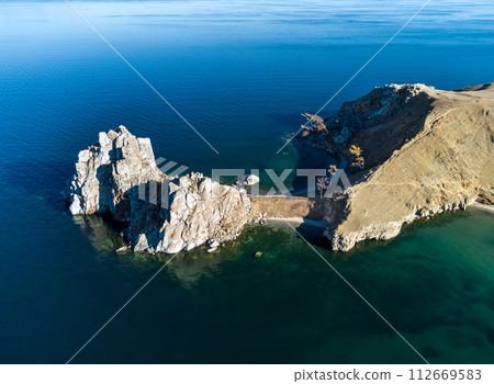 Sarayskiy beach. Shamanka Rock. Lake Baikal at Olkhon Island. the village of Khuzhir 112669583