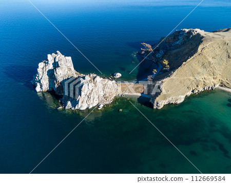 Sarayskiy beach. Shamanka Rock. Lake Baikal at Olkhon Island. the village of Khuzhir Sarayskiy beach. Shamanka Rock. Lake Baikal at Olkhon Island. the village of Khuzhir 112669584