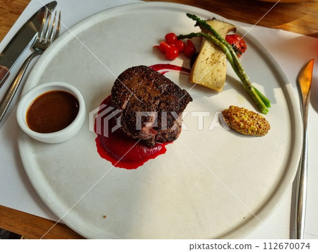 a gourmet beef steak plate 112670074