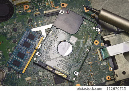 Image of hard disk, RAM, and motherboard viewed from above. Image of hard disk, RAM, and motherboard viewed from above. 112670715