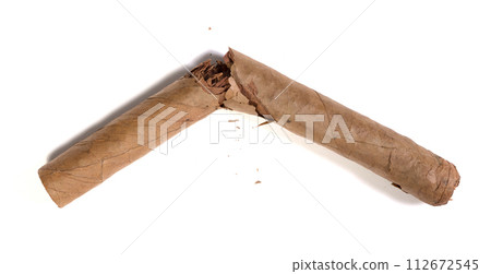 Broken cigar, close up.- Isolated on white 112672545