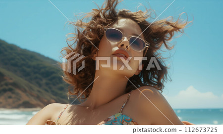 Caucasian woman relaxing on the beach. 112673725
