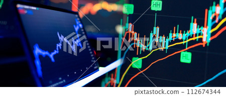 Financial chart with up trend line graph. Stock market or forex trading graph and candlestick chart suitable for financial investment concept. 112674344