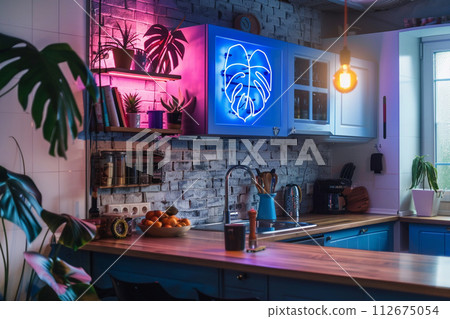 Neon sign monstera in decor of kitchen in modern apartment Neon sign monstera in decor of kitchen in modern apartment 112675054