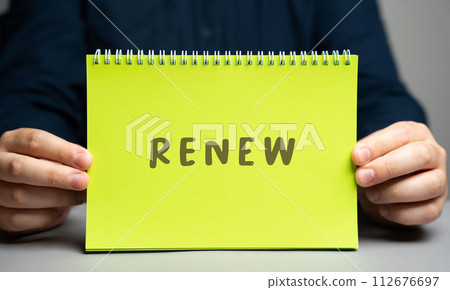 Renew concept. Business planning, strategy, and goals concepts. Ideas, motivation and self-motivation. Note in male hands 112676697