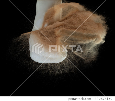 Boxing punch through Sand, concept of competition challenge of leader business man or teamwork, winning leadership strategic plan and risk management team player 112678139