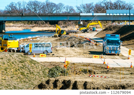 Riverbed revetment construction and construction vehicles Miyako River 2024.02 e-3 light color Riverbed revetment construction and construction vehicles Miyako River 2024.02 e-3 light color 112679094