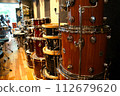 Drums lined up at a music store 112679620