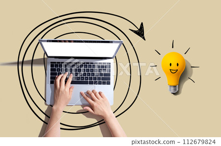 Creativity, inspiration, idea concept with light bulb and laptop computer Creativity, inspiration, idea concept with light bulb and laptop computer 112679824