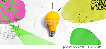 Yellow light bulb with handwritten sketch Yellow light bulb with handwritten sketch 112679855