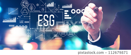 ESG theme with a businessman holding a marker 112679871