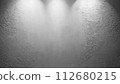 concrete wall with sunlight shining through it 112680215